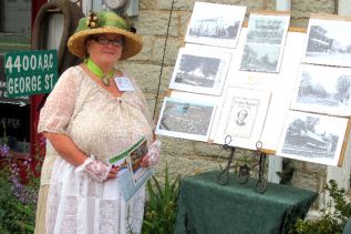 Christine Kennedy in full costume talking about Sydenham's days of yore